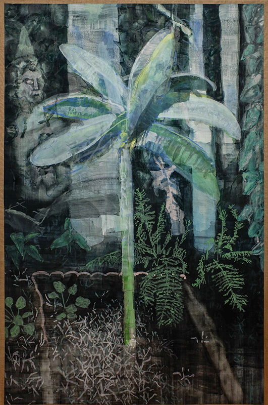 Banana tree with a figure behind